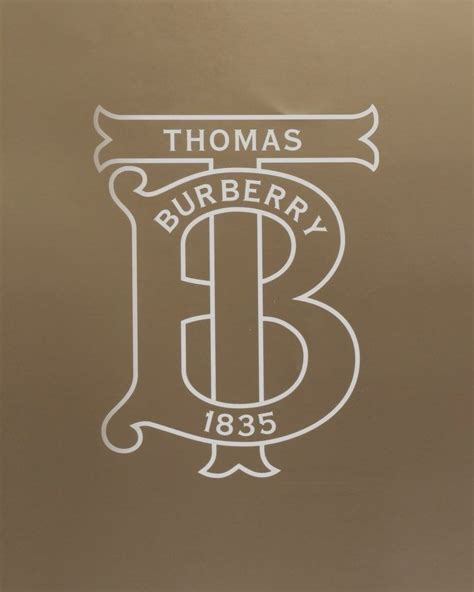 why does burberry have a t|thomas burberry tb.